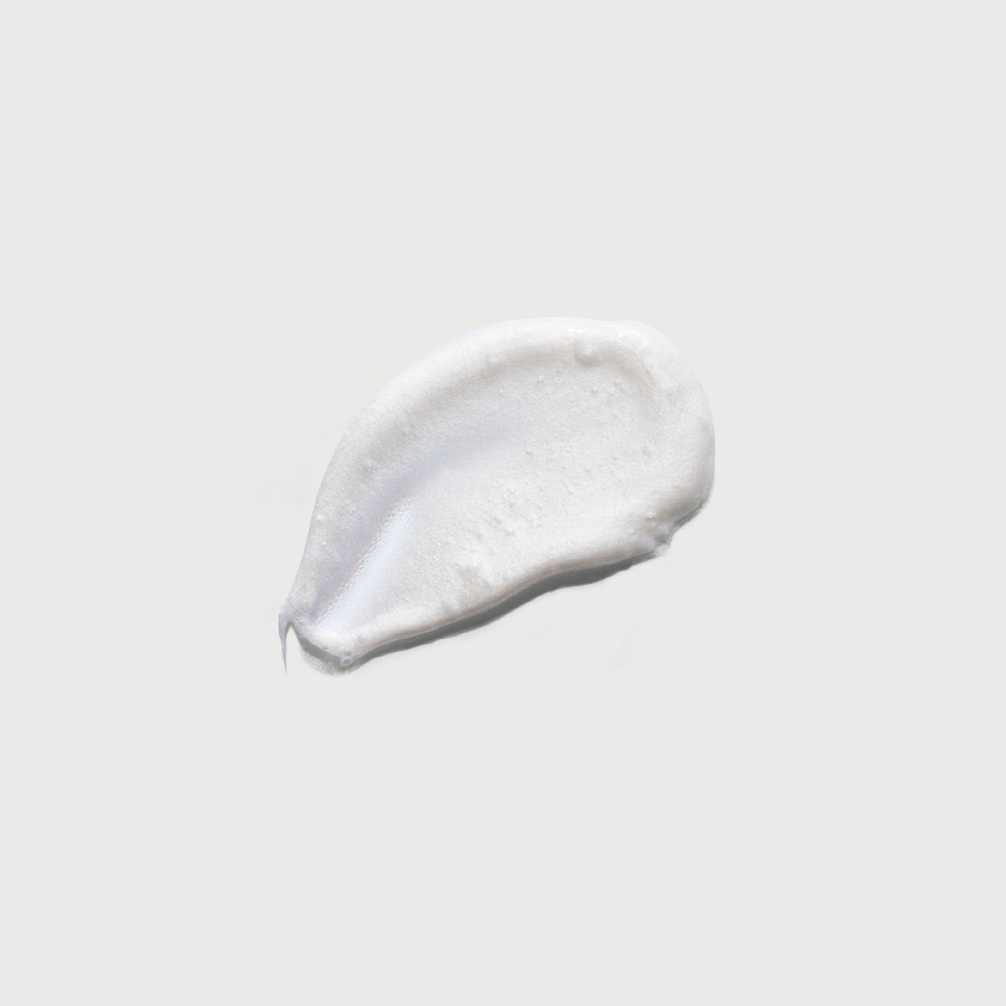 the-smoother-glycolic-acid-exfoliating-body-wash-j2 NATR-40002-Swatch-The-Smoother-Glycolic-Acid-Exfoliating-Body-Wash-bonebkgd.jpg