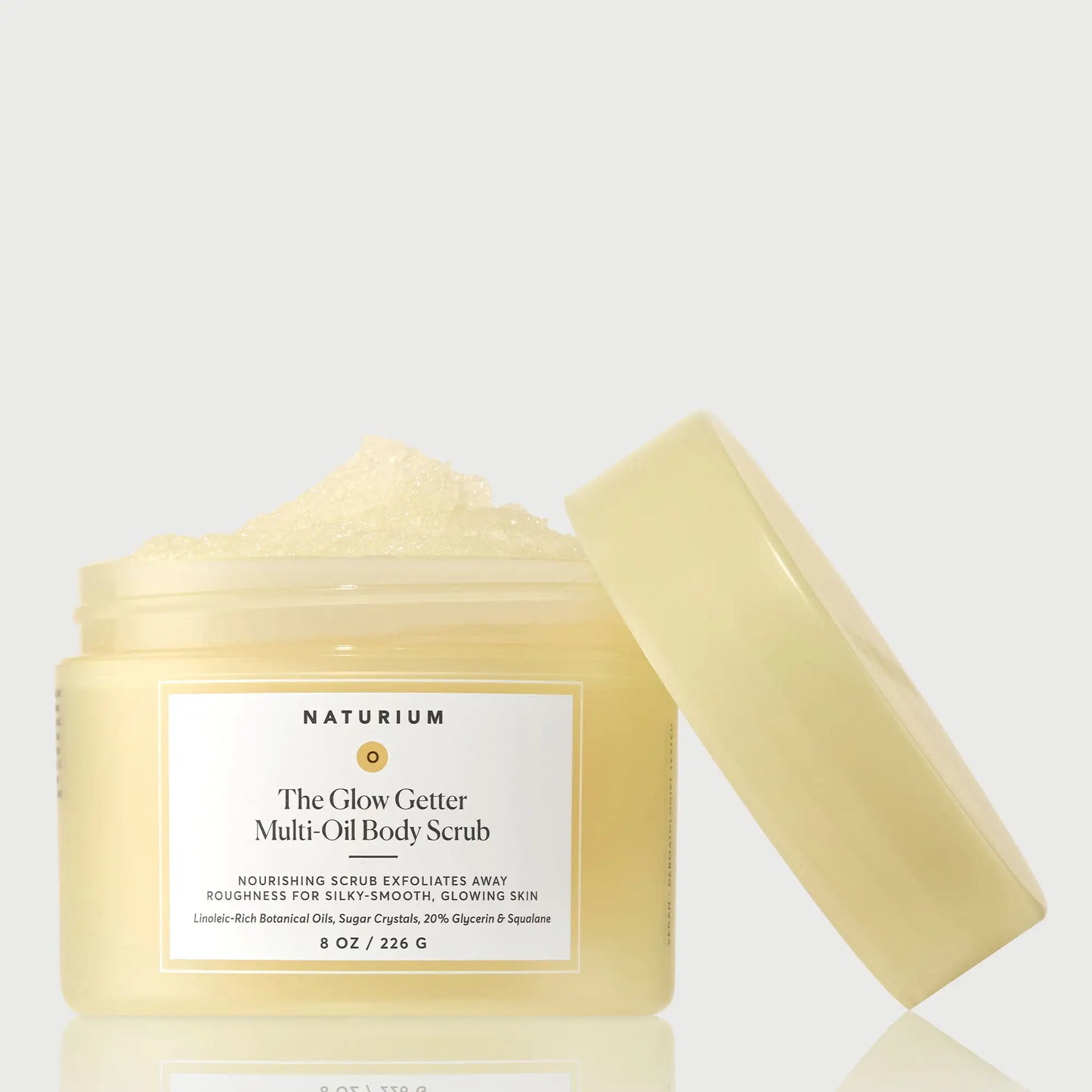 the-glow-getter-multi-oil-body-scrub-m7 NATR-40028-GlowGetter-Multi-Oil-Body-Scrub-Front-CapOff-bonebkgd.webp